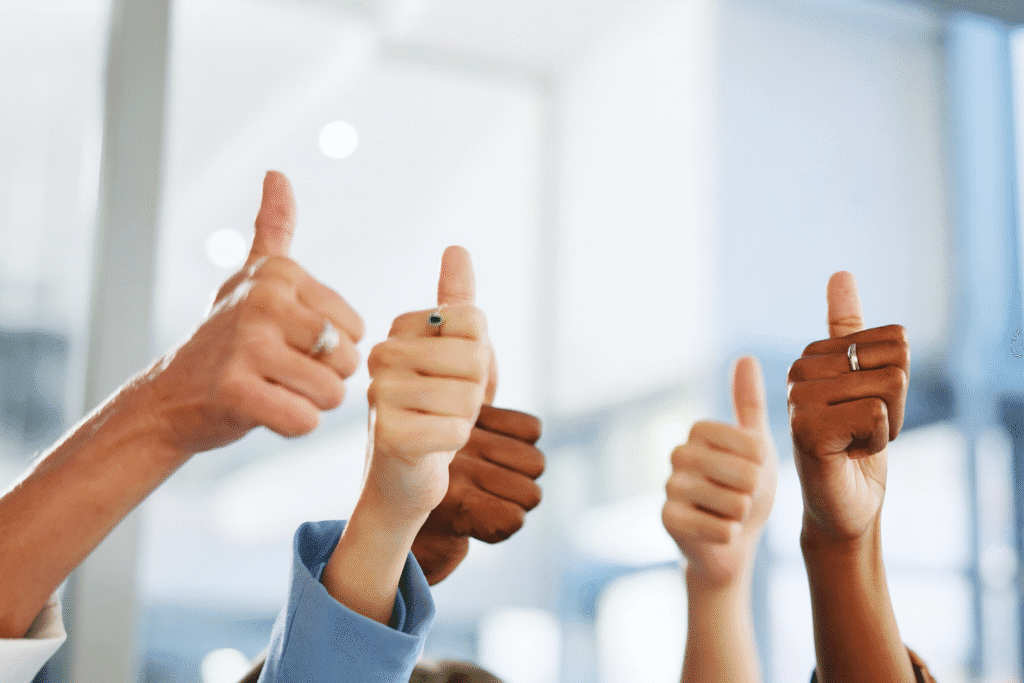 Multiple hands giving a thumbs-up, representing why customers choose us for quality workmanship, cleanliness, and reliable service.