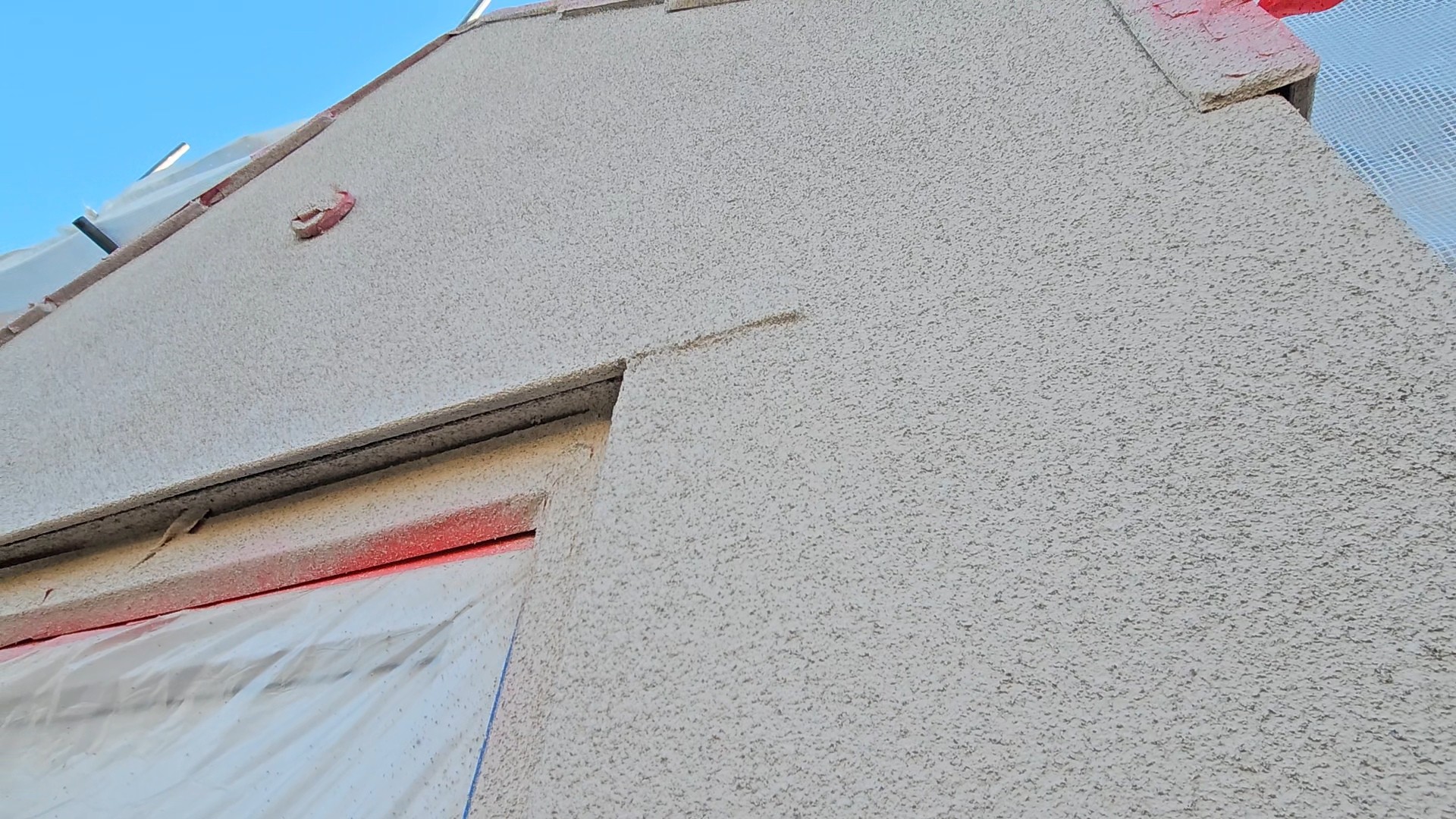 External wall coated with spray cork insulation finish