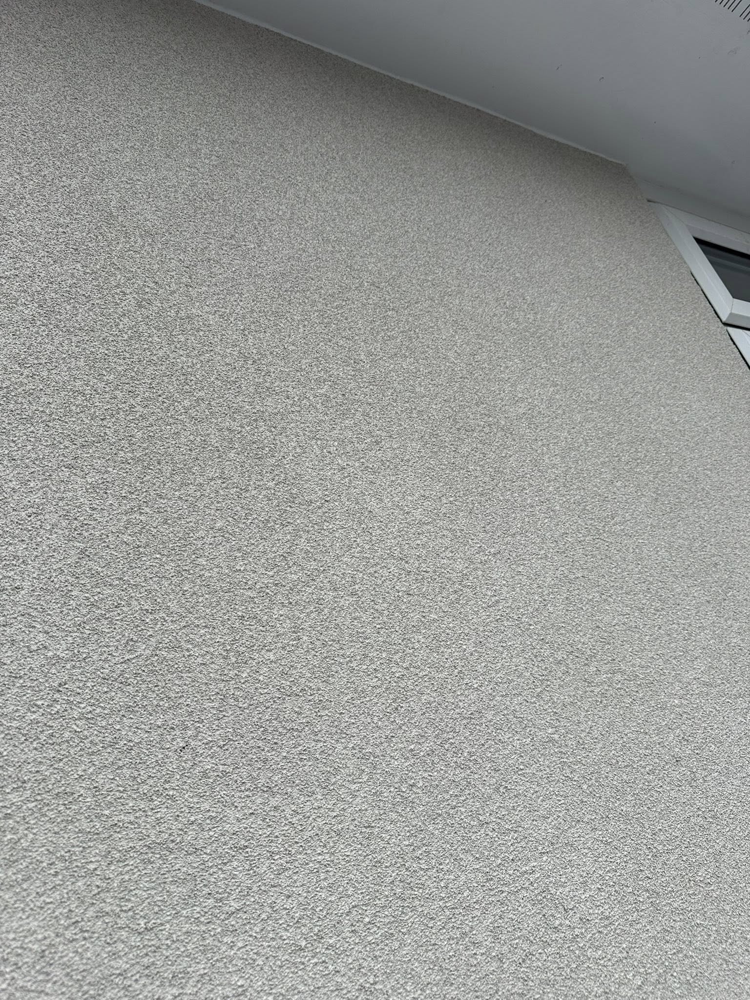 Wall coated with Bianco spray cork finish for protection and clean appearance