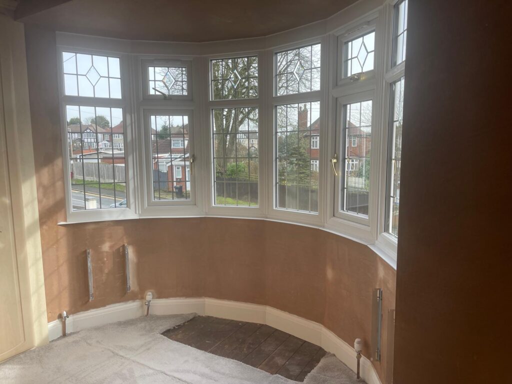 Insulated and plastered bay window previously cold now warm and improved